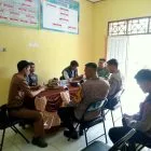 Babinsa dan Bhabinkamtibmas Bersinergi Pantau Kegiatan serta Keamanan Desa